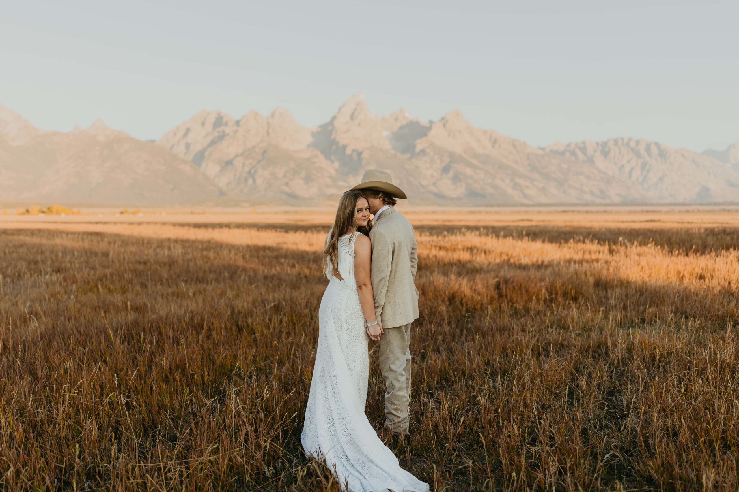 A couple eloping at mormon row in jackson hole wyoming for their wedding