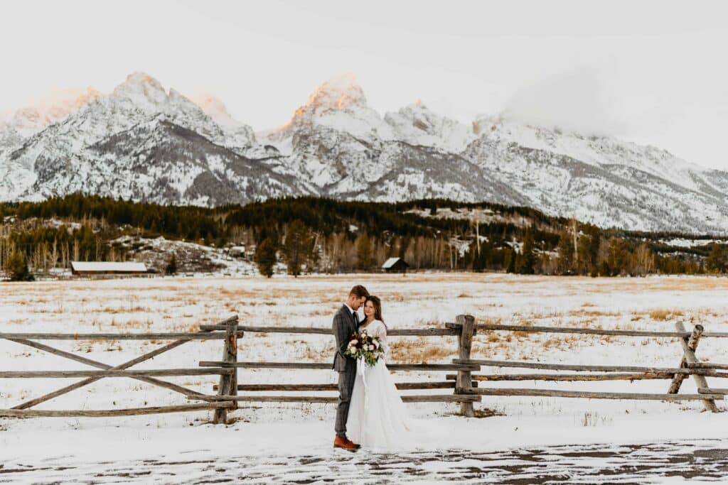A bridal photo in front of the Tetons during a Grand Teton National Park elopement in the winter