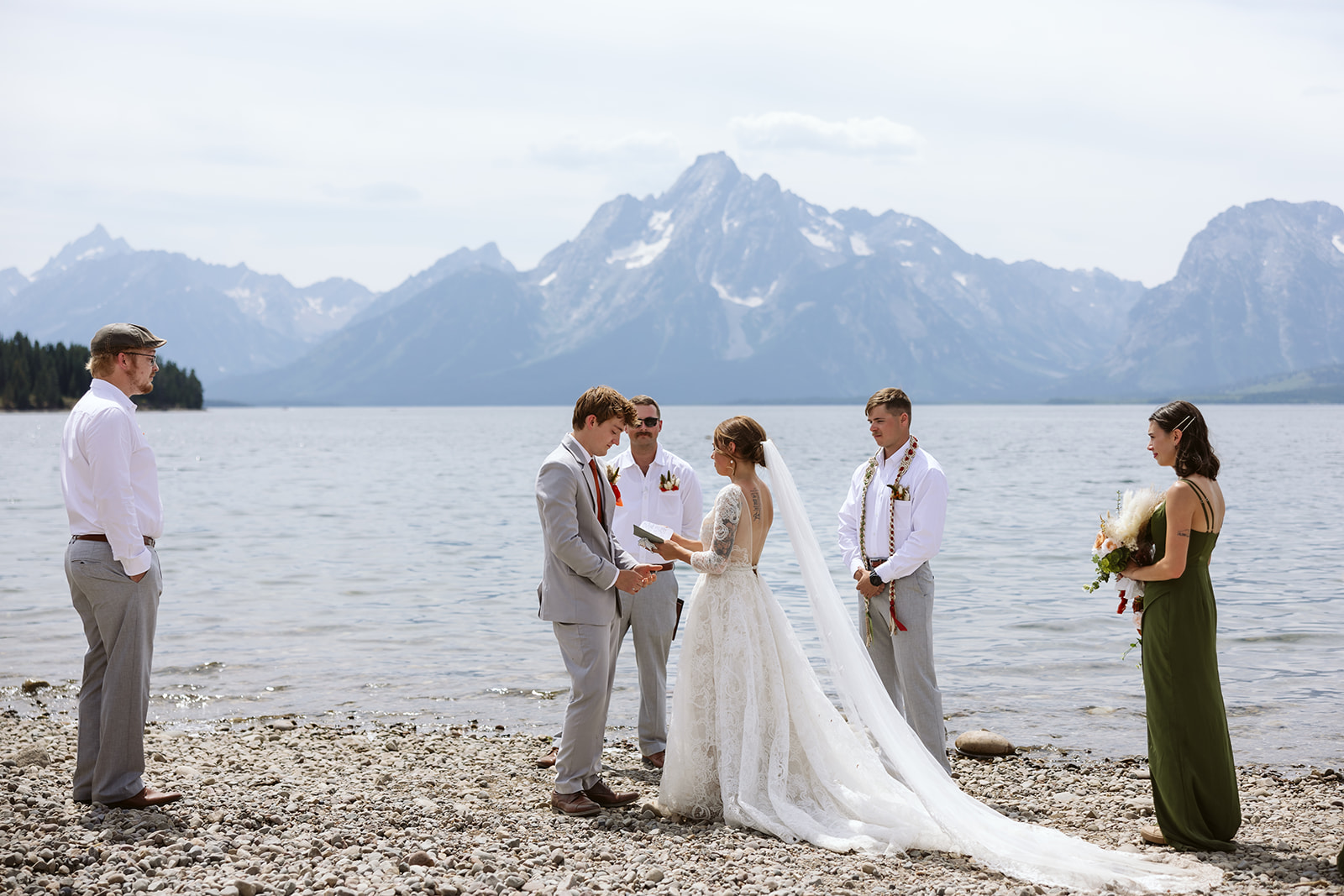 couples getting married at colter bay swim beach