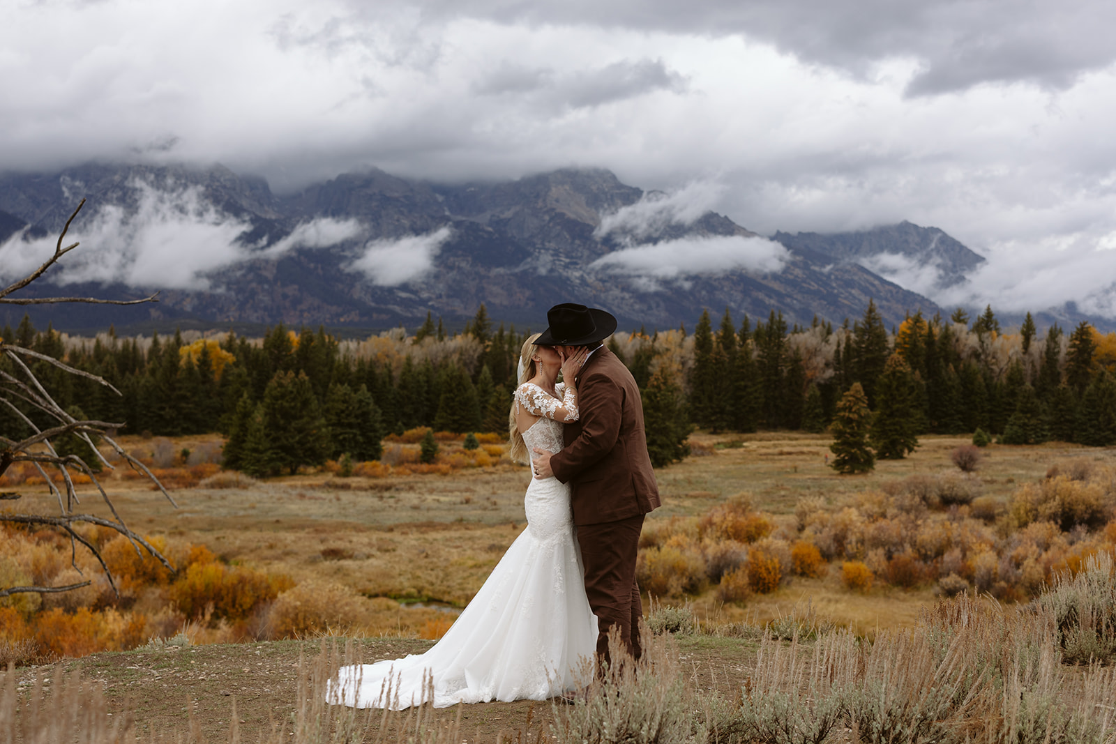 A couple during their elopement ceremony at Blacktail Ponds Overlook